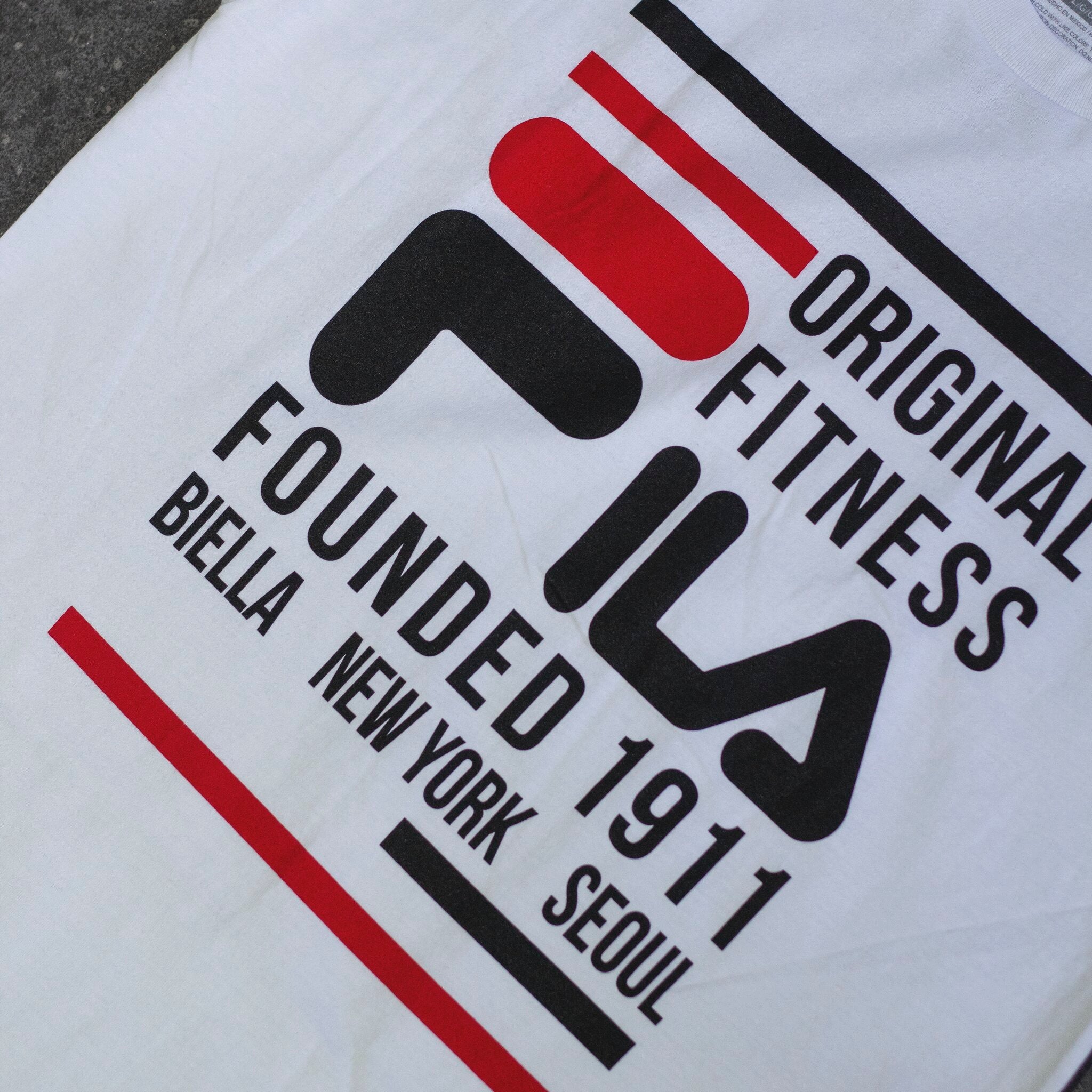 FILA PLAYERA FILA BLANCA ANUN