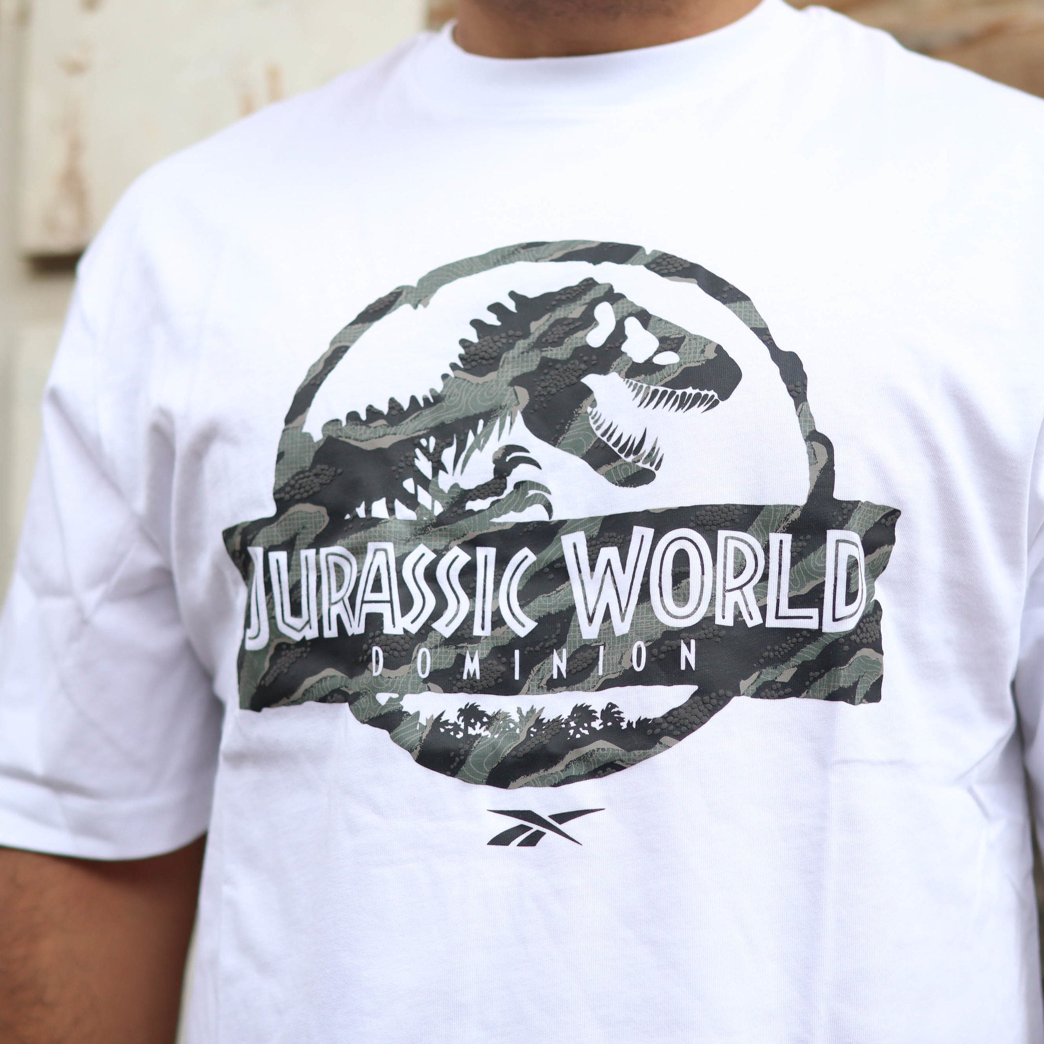 REEBOK TEE JURASSIC WORLD LOGO WHITE