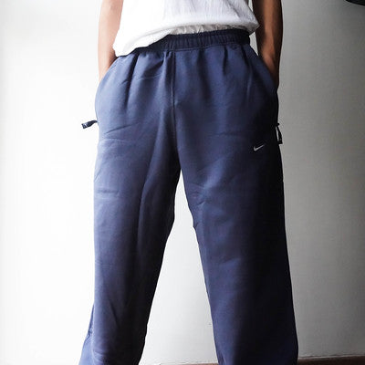 NIKE PANTS SOLO SWOOSH FULL ZIP THUNDER BLUE