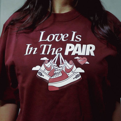 NIKE TEE LOVE IS IN THE PAIR WINE W