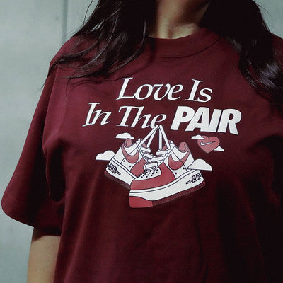 NIKE TEE LOVE IS IN THE PAIR WINE W
