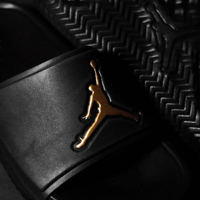 JORDAN SLIDE BLACK GOLD GS