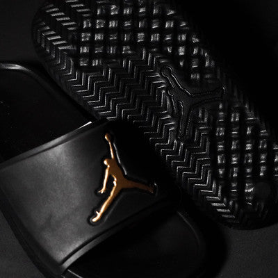 JORDAN SLIDE BLACK GOLD GS