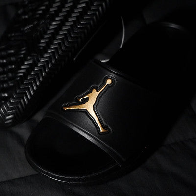 JORDAN SLIDE BLACK GOLD GS