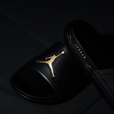 JORDAN SLIDE BLACK GOLD GS