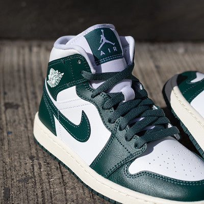 Green white and black jordan 1s best sale