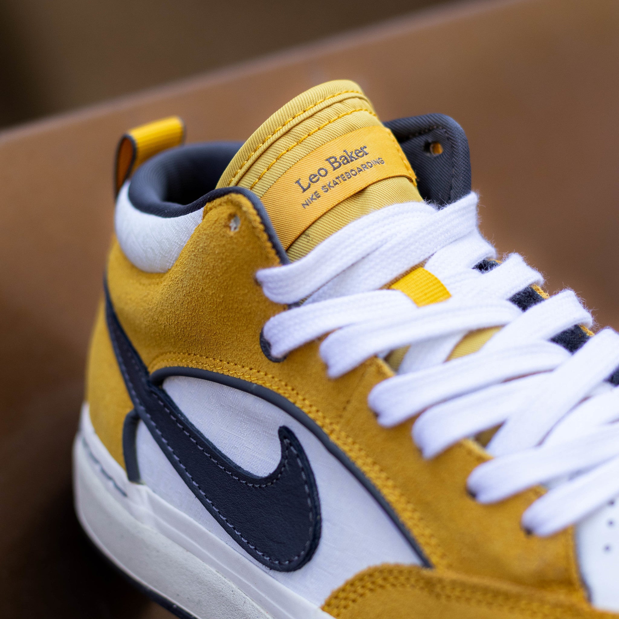 NIKE SB REACT LEO UNIVERSITY GOLD