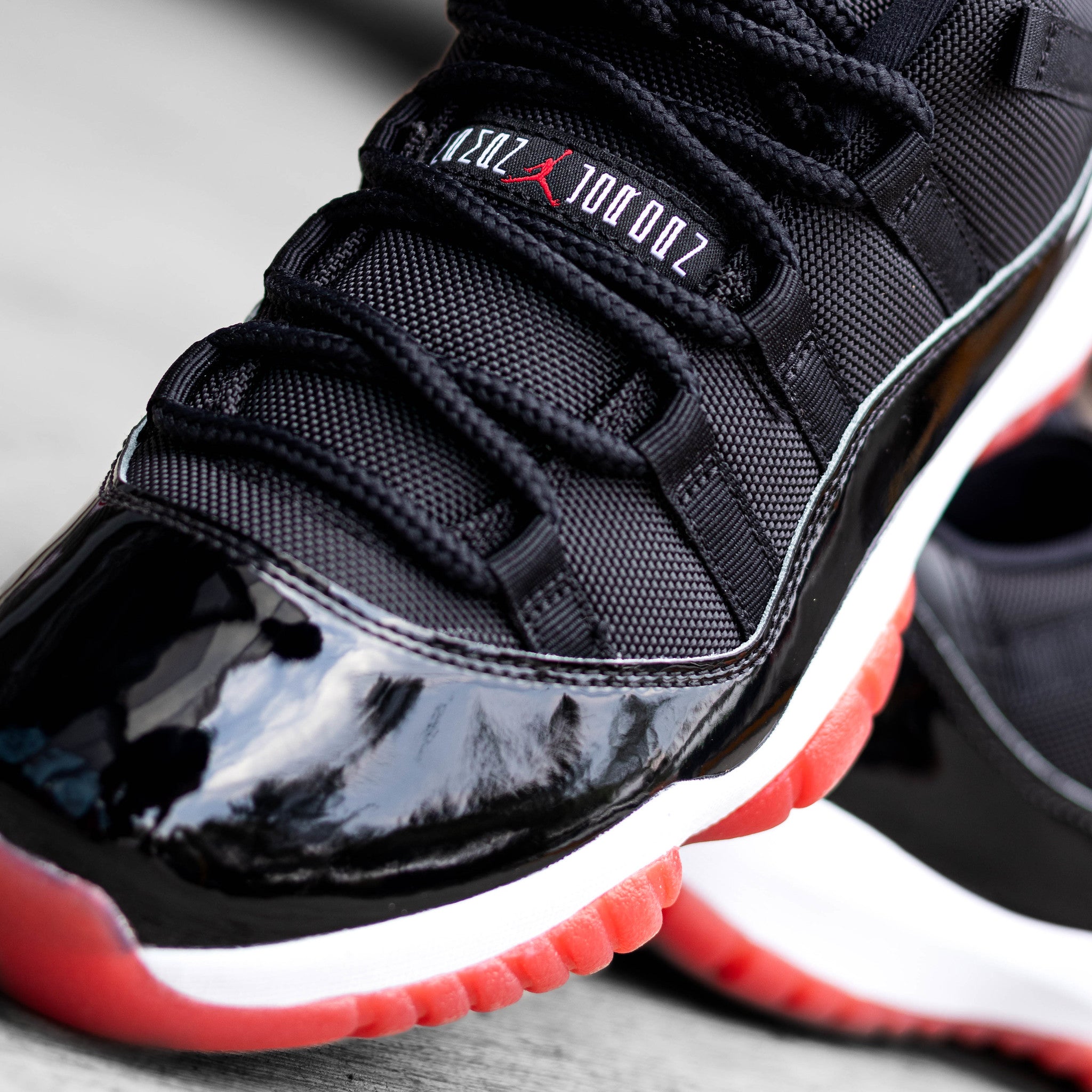 AIR JORDAN 11 LOW BRED