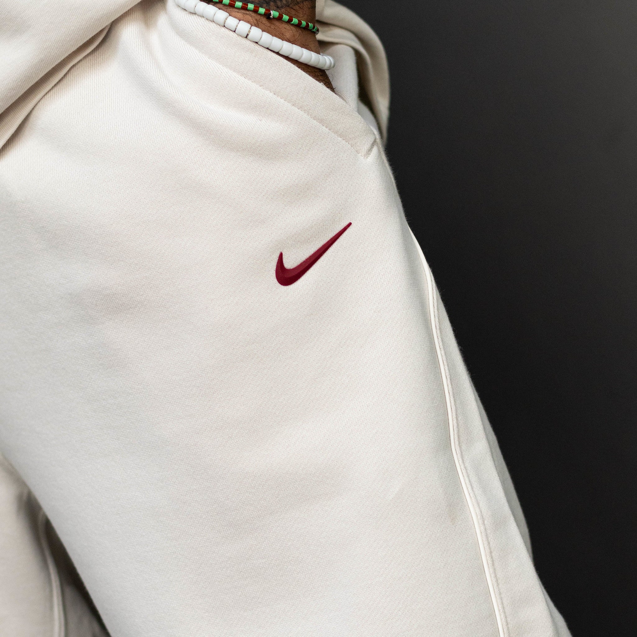 NIKE NOCTA CARDINAL FLEECE PANTS OREWOOD