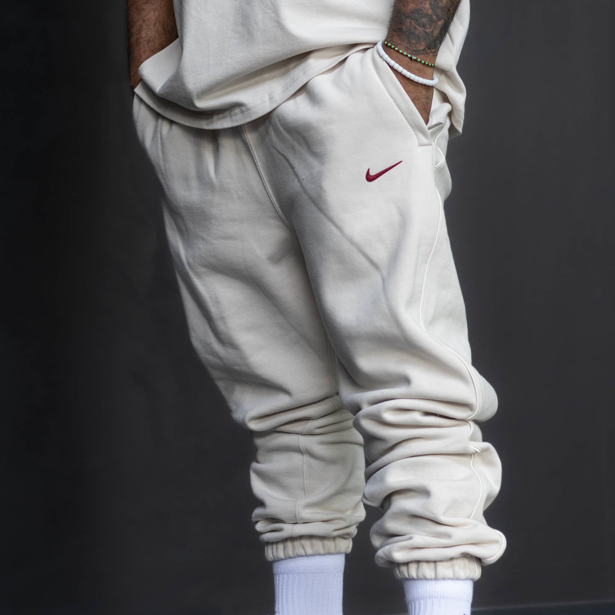 NIKE NOCTA CARDINAL SWEATPANTS OREWOOD