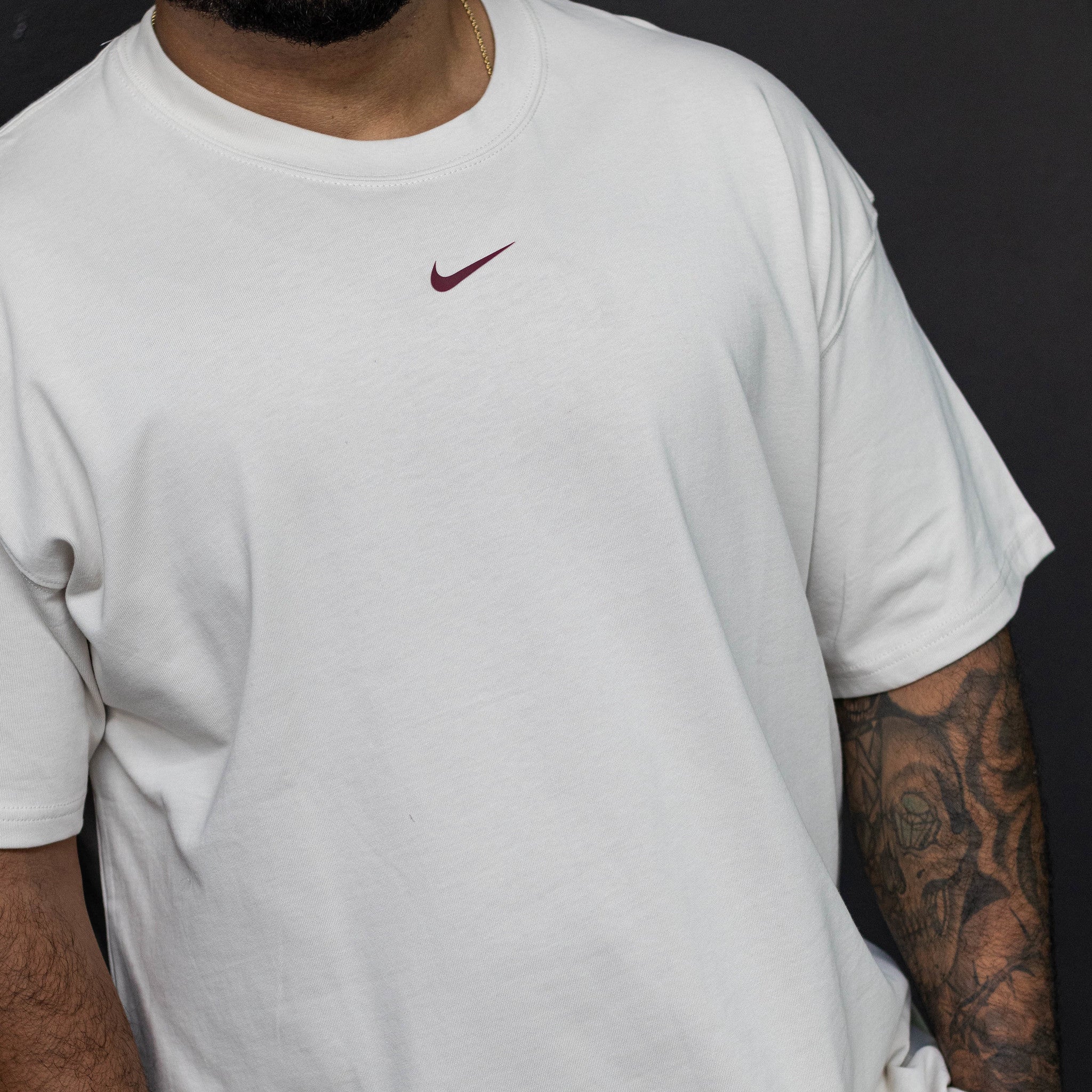 NIKE NOCTA CARDINAL TEE OREWOOD