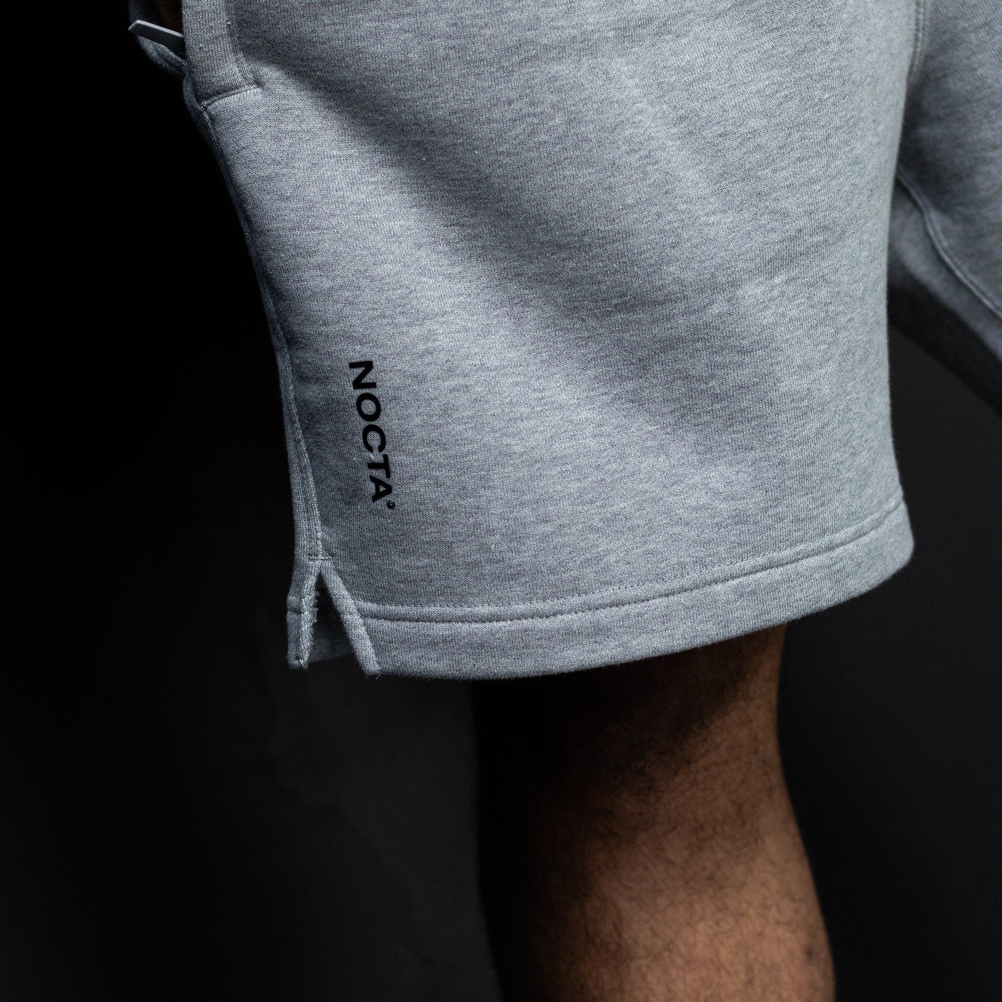 NIKE NOCTA CARDINAL SHORT GREY
