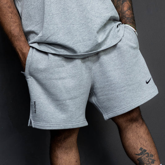 NIKE NOCTA CARDINAL SHORT GREY