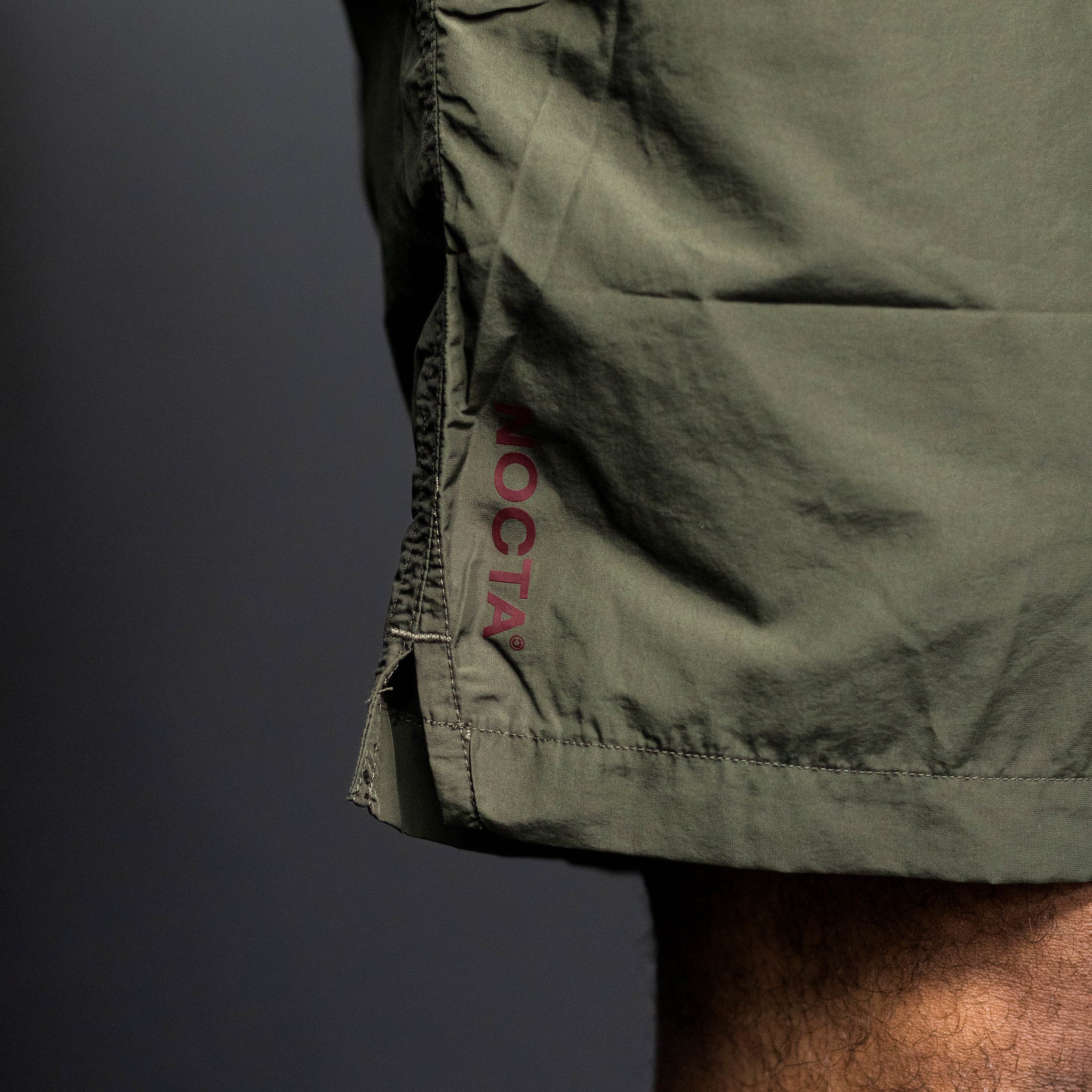 NIKE NOCTA CARDINAL SHORT WVN CARGO
