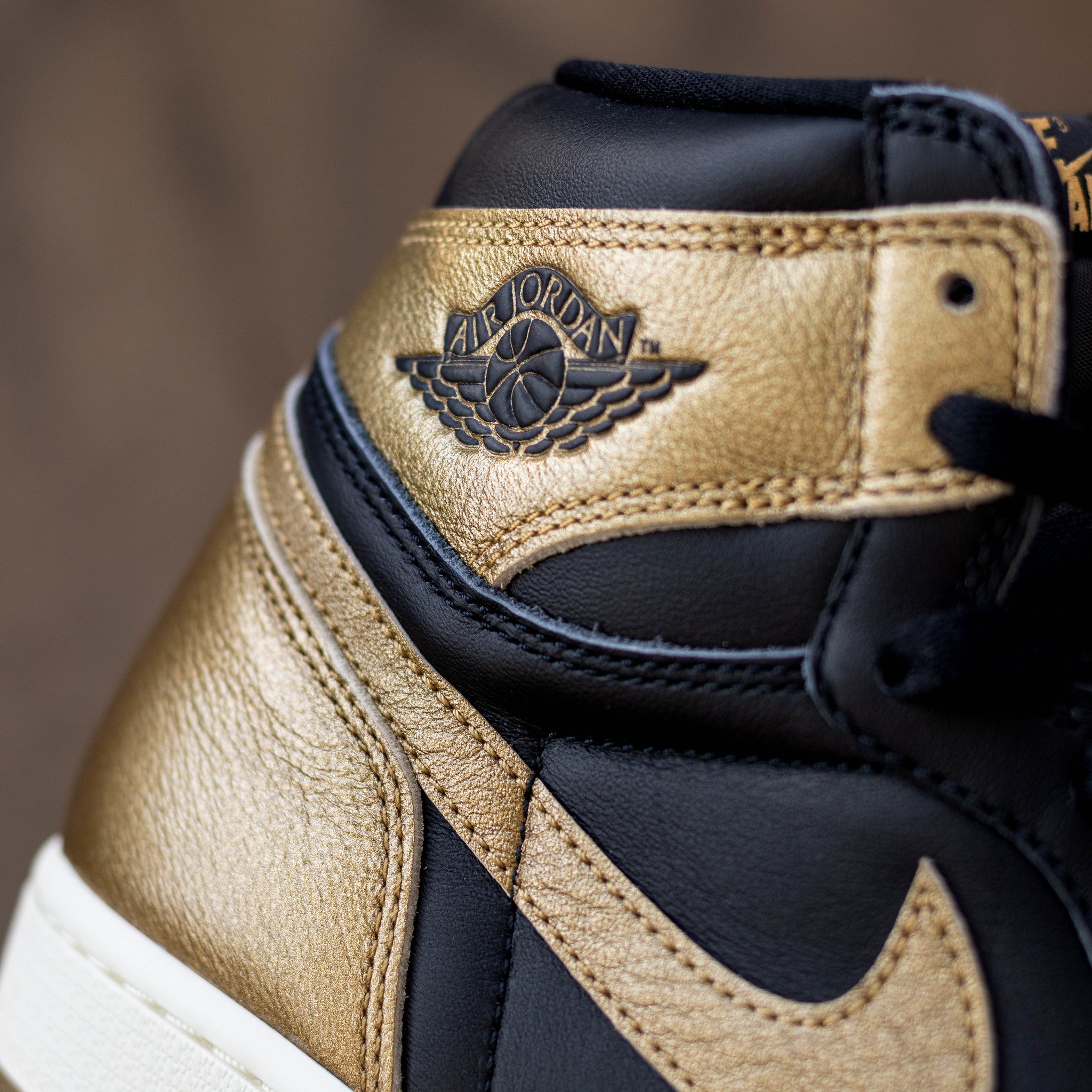 AIR JORDAN 1 HIGH BLACK AND GOLD