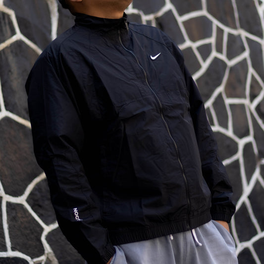 NIKE X NOCTA WOVEN TRACK JACKET BLACK