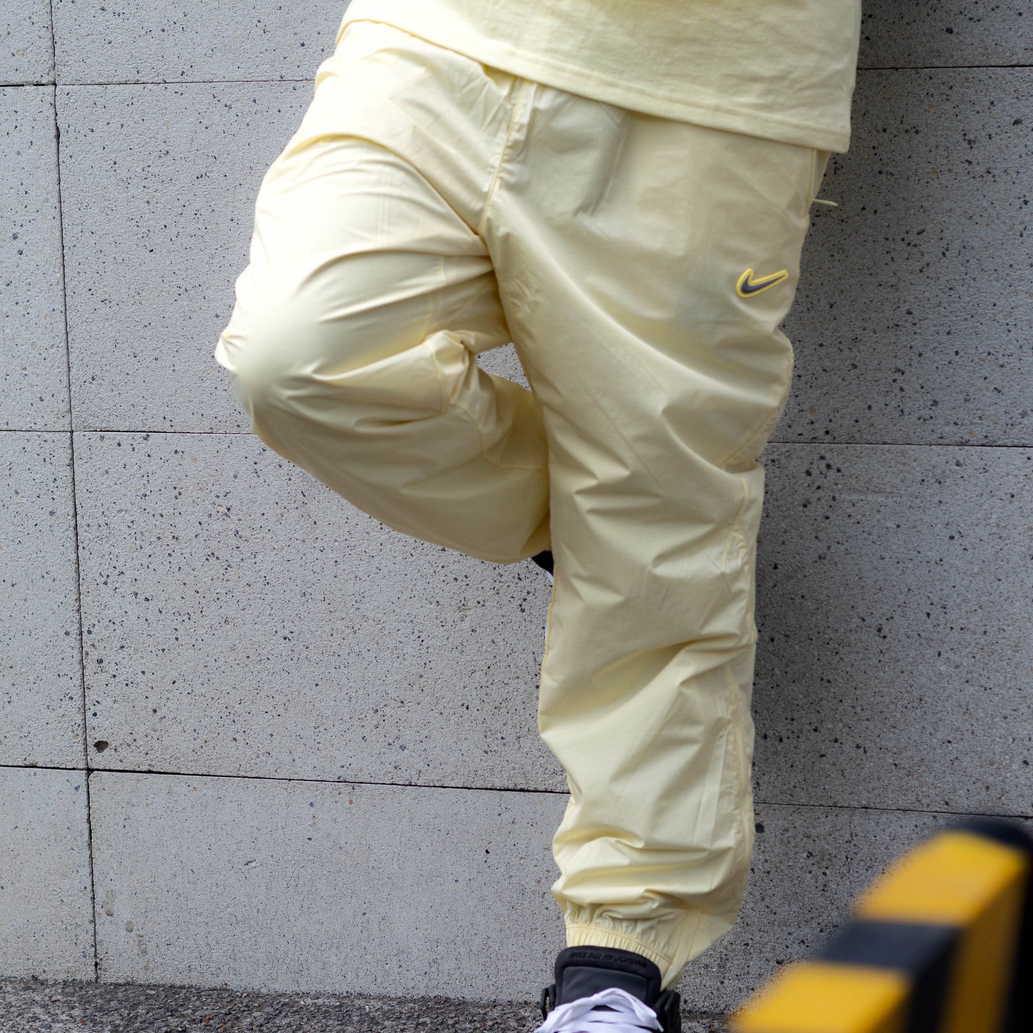 NIKE NOCTA TRACKER PANTS ALABASTER