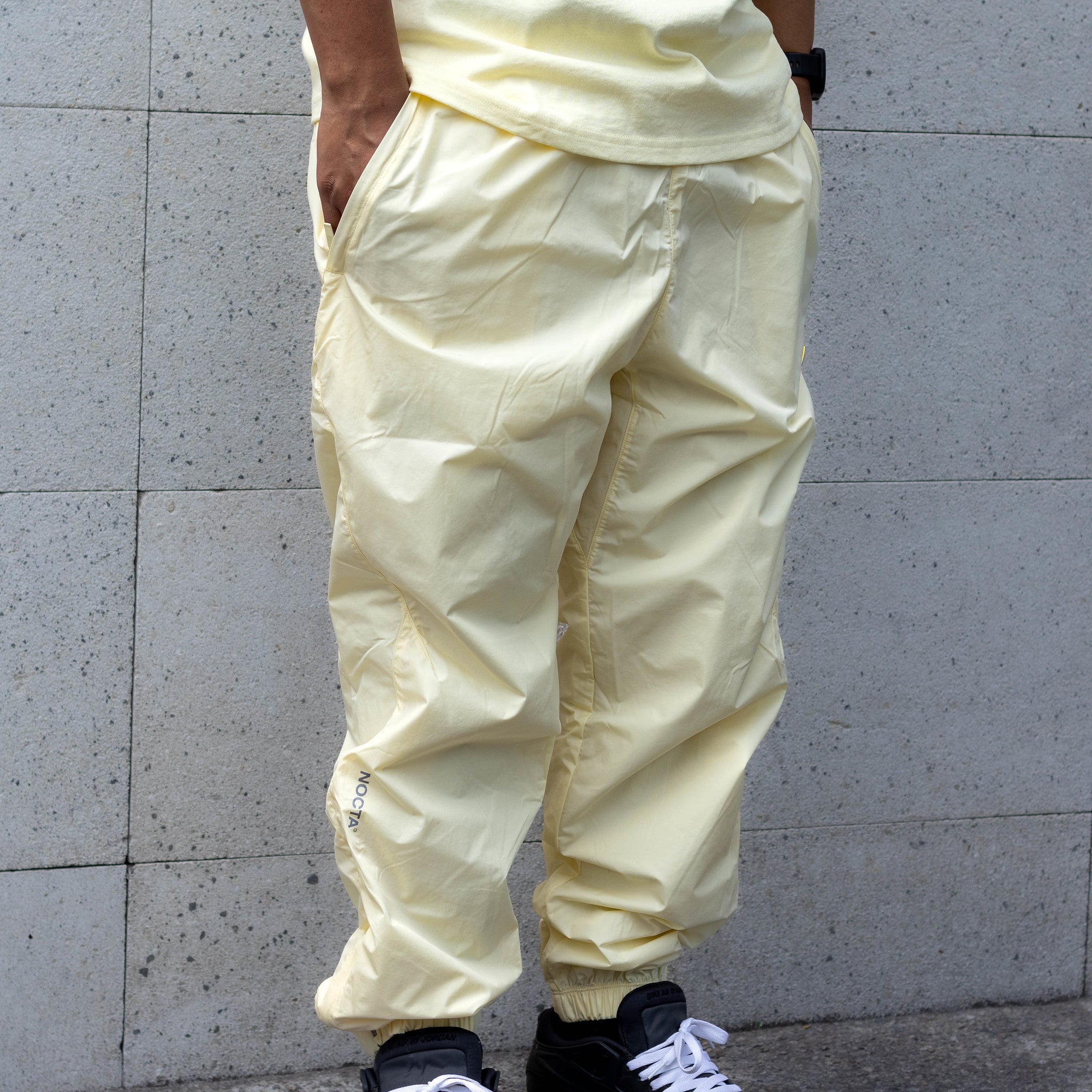 NIKE NOCTA TRACKER PANTS ALABASTER