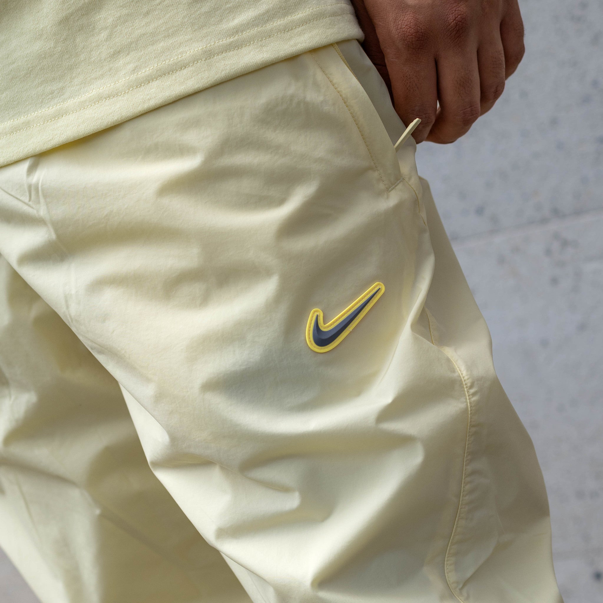 NIKE NOCTA TRACKER PANTS ALABASTER