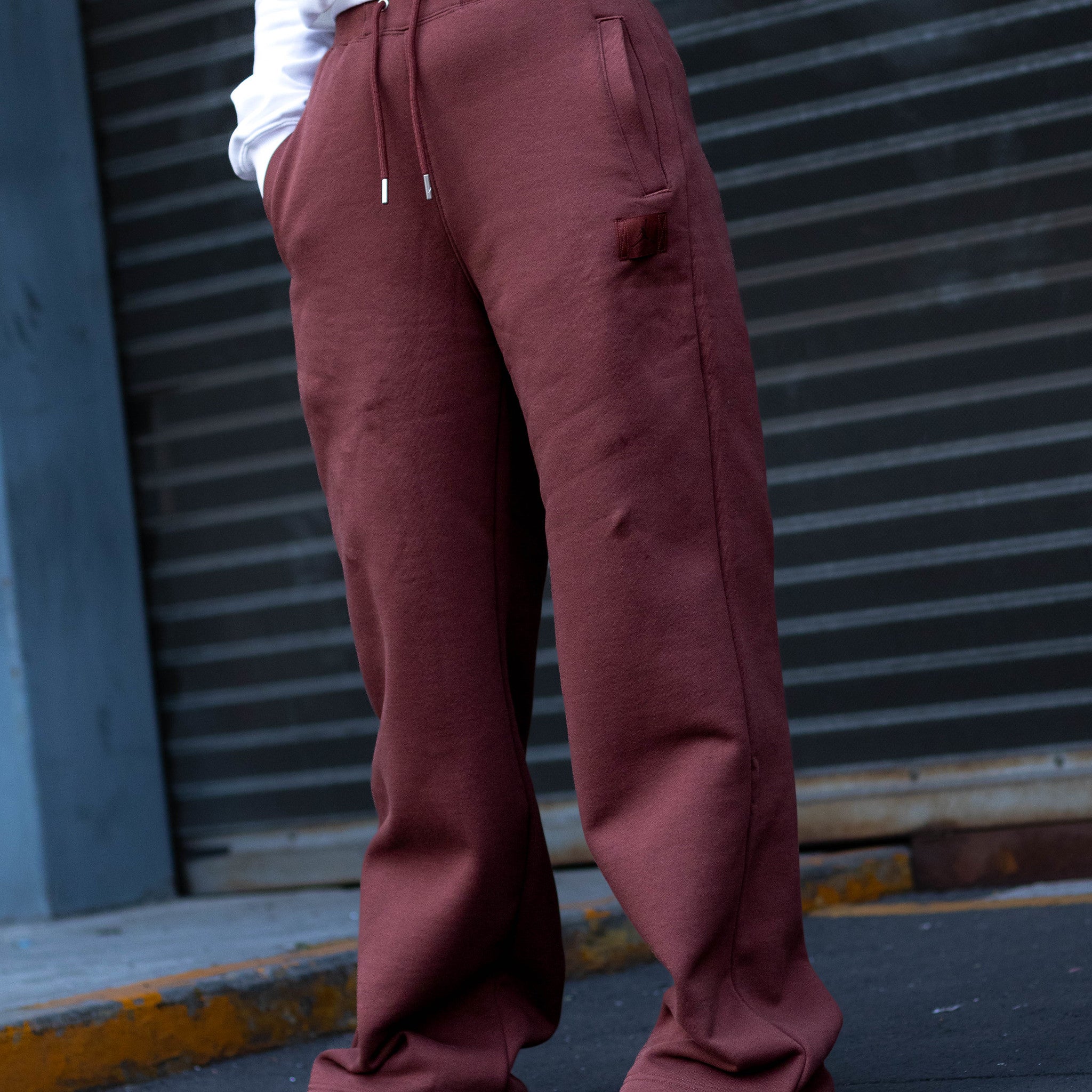 JORDAN FLIGHT FLECCE PANT OPEN HEM PONY