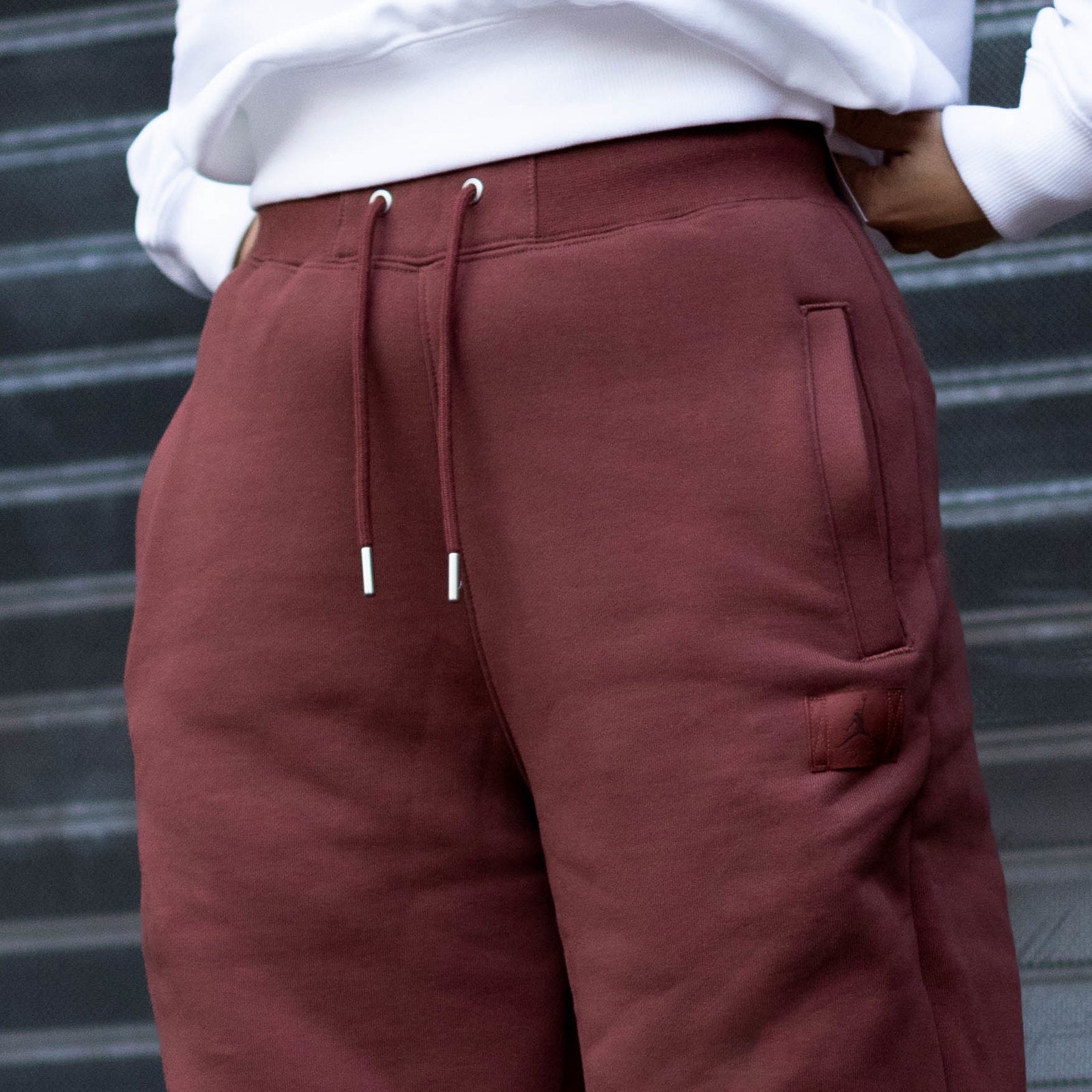 JORDAN FLIGHT FLECCE PANT OPEN HEM PONY
